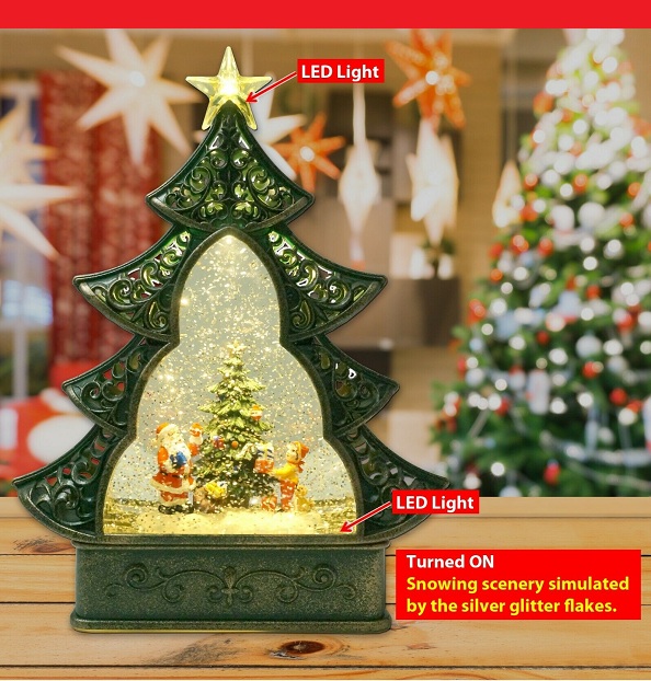 christmas tree lighted snow globe